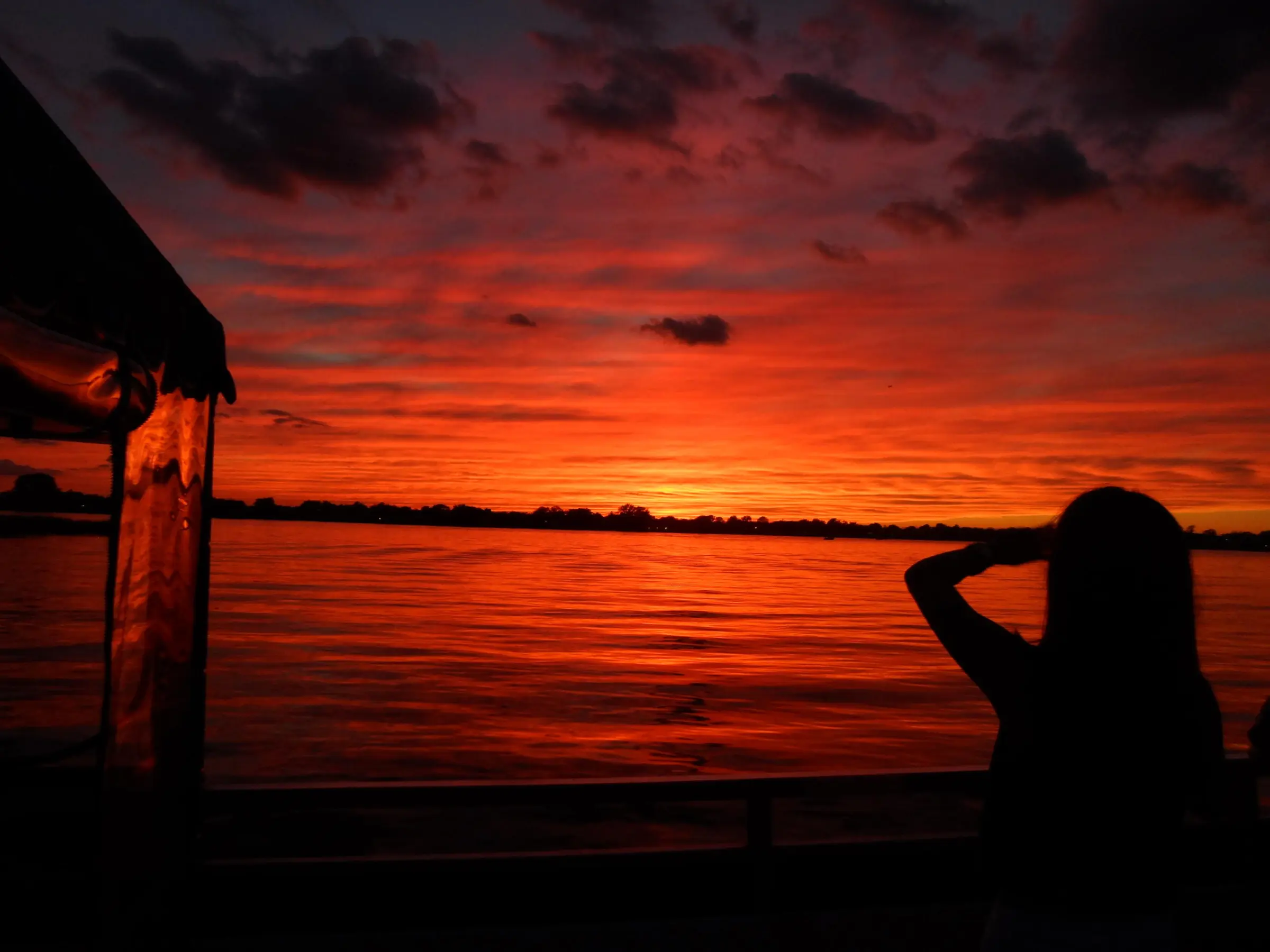 Woman looking at sunset
