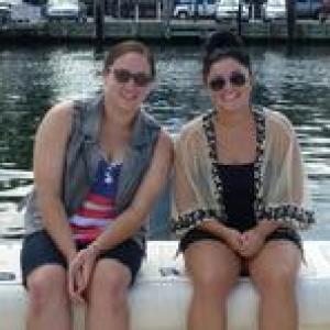 Two woman posing for photo