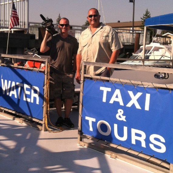 Rick and friend on the back of the boat